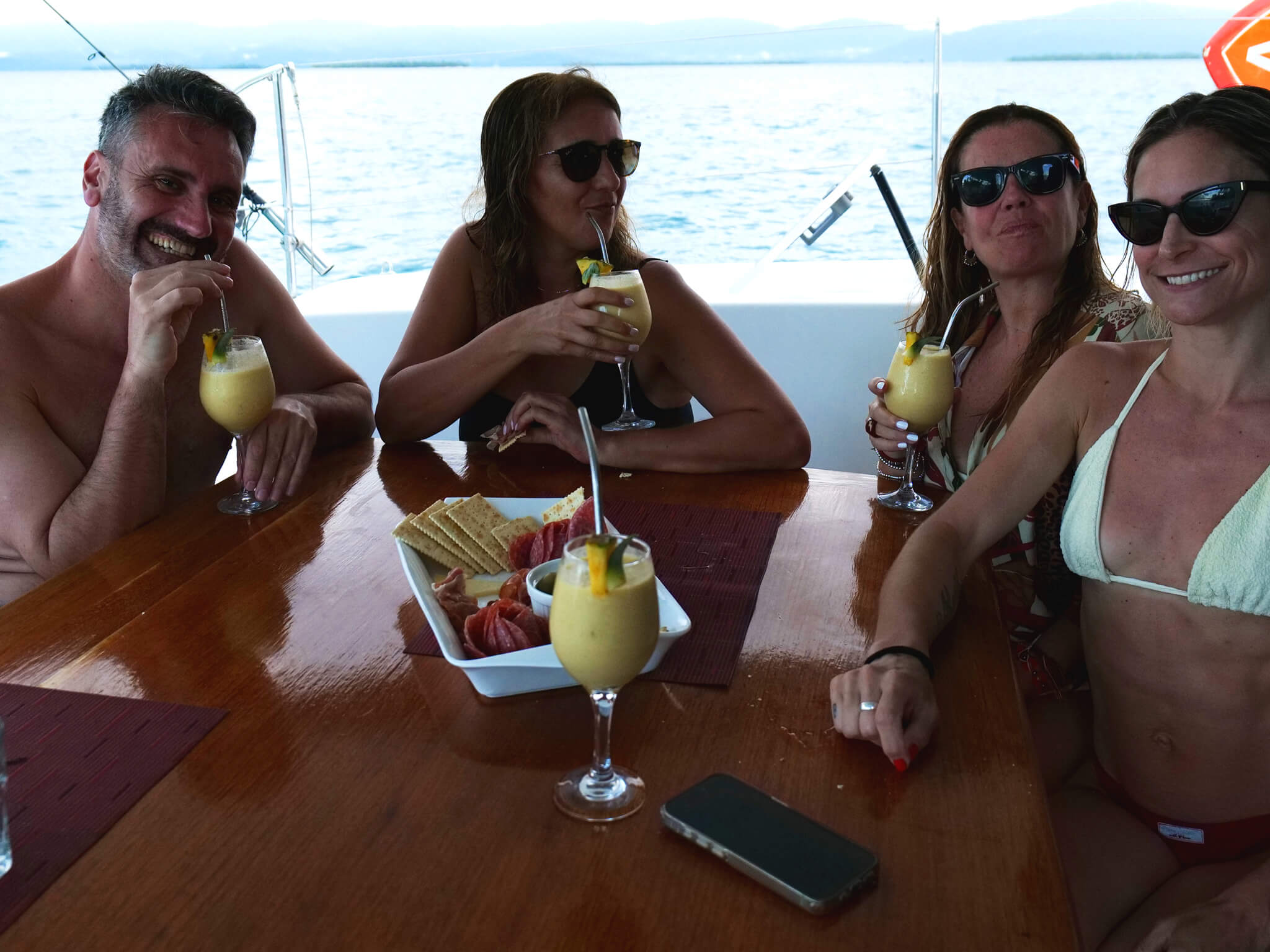 passengers enjoying catamaran atila. San Blas Archipelago, Panama.